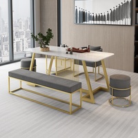 Ensemble table et chaises en marbre de luxe nordique avec structure en fer, personnalisable pour le bureau et la maison