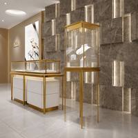 Vitrine de luxe en or blanc pour bijoux, présentoir en verre trempé pour colliers et bagues en magasin de détail