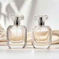 Offre Spéciale exquise bouteille vide de vaporisateur de parfum en verre clair rectangulaire avec couvercle personnalisé 30ml 50ml 100ml atomiseur d'emballage