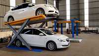 Ascenseur de voiture personnalisé à 2 étages Ascenseur de stationnement inclinable en acier à 4 montants Équipement de véhicule Système de levage de véhicule