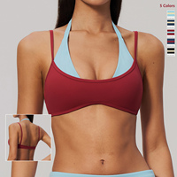 Nouveau soutien-gorge de yoga color-block 2-en-1 brossé 2026 avec bretelles doubles et col halter pour la course, le fitness et les activités sportives pour femme