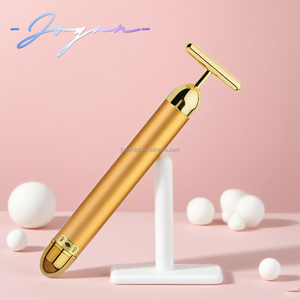 เครื่องนวดหน้าทองคำ 24K แบบสั่นสะเทือน ยกกระชับผิวหน้าและผิวกาย พร้อมลูกกลิ้งหยกกัวซา - Product Image 1