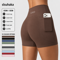 Shorts de yoga taille haute pour femmes OEM avec poches latérales, coutures plates, compression, large ceinture, style cycliste, vêtements de sport, vente en gros