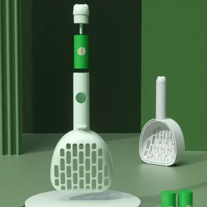 Pala de plástico para residuos de gatos, pala con bolsa para excrementos, color verde, morado y blanco, venta al por mayor