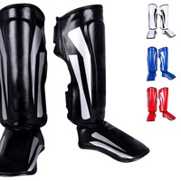 Protège-tibias de kickboxing personnalisés en cuir PU de qualité supérieure, durables, ajustables, à couverture intégrale pour l'entraînement et le sparring