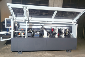 เครื่องปิดขอบไม้แบบอัตโนมัติ JUNDE 10KW สำหรับงานไม้แผ่นอุตสาหกรรม พร้อมระบบตัดแต่งและกัดแต่งหน้าไม้ - Product Image 3