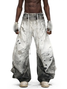 Jeans en denim pour hommes de haute qualité, personnalisés, avec œillets, effet déchiré et imprimé, délavé blanc, coupe large, style streetwear hip-hop, en coton, OEM ODM - Product Image 1