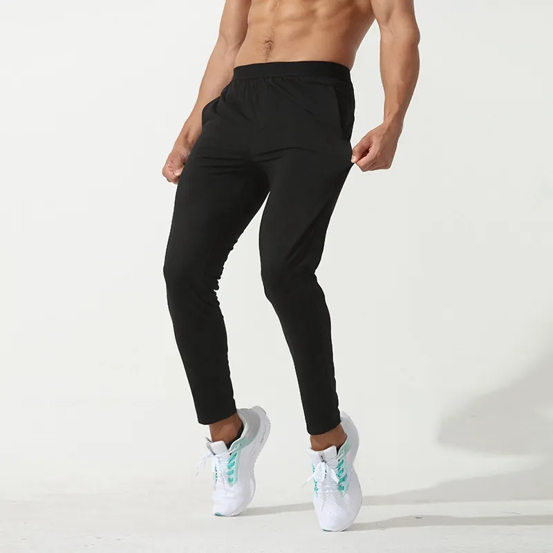Celana olahraga bulu hangat pria, bawahan kustom luar ruangan Fitness lari pinggang belakang dengan saku untuk latihan