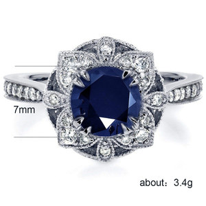 Elegante anello a forma di fiore cavo per donna, design con pietre blu intarsiate, gioielli alla moda - Product Image 6