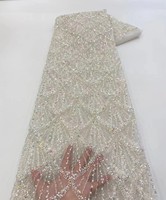 Tissu en dentelle brodée de sequins en gros pour robes de mariée et tenues de mariage