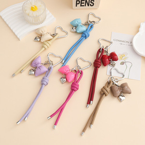 พวงกุญแจหนังถักสไตล์เกาหลีรูปโบว์น่ารัก สำหรับตกแต่งกระเป๋า - Product Image 1