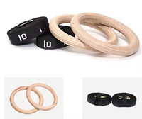 Vente en gros Fabricant chinois Anneaux de gymnastique en bois avec boucle à came réglable et longues sangles anneaux d'entraînement antidérapants