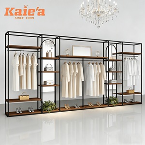Support d'affichage <span class=keywords><strong>doré</strong></span> pour magasin de vêtements, porte-vêtements en acier inoxydable, boutique de vêtements pour femmes, présentoirs de vêtements, design de boutique de vêtements - Product Image 4