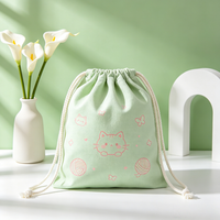 Pochettes à cordon en toile de coton recyclé lavables sur mesure et sacs d'emballage cadeau réutilisables à motif de dessin animé écologique