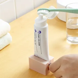 घर प्लास्टिक टूथपेस्ट ट्यूब निचोड़ने आसान औषधि रोलिंग धारक बाथरूम की आपूर्ति दांत की सफाई सामान