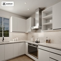 Meuble de cuisine contemporain en PVC en forme de L avec portes en dalles blanches, poignées intégrées et boîtes de rangement en contreplaqué