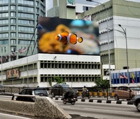 Panneau publicitaire numérique extérieur P10 Big LED Mur vidéo en fer 10mm IP65 Panneau LED monté sur le toit de 10 mètres pour l'animation de bâtiments