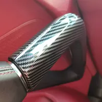 Volant en fibre de carbone modifié avec accessoires de poignée intérieure, de gants et d'accoudoir