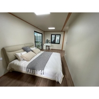Maison conteneur extensible de 20 pieds à panneaux sandwich contrôlée par l'IA avec climatisation et salle de bain