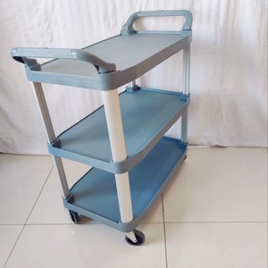 Chariot de service hôtelier en plastique à trois niveaux Shanghe 103x96x50cm, silencieux, pour la livraison de nourriture en milieu commercial - Product Image 1