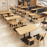 Ensemble table et chaises de haute qualité pour fournisseurs, avec coussins de siège en cuir confortables et durables, idéal pour les restaurants et les cafés