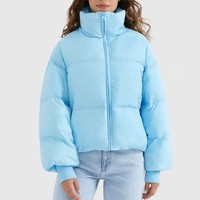 Doudoune réversible à capuche pour femme Hiver 2025, coupe ample, en nylon avec logo et détails boutonnés, style simple