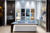 Vitrine d'exposition de montres classique de luxe avec éclairage LED, en verre trempé et métal, pour les boutiques de vente de montres traditionnelles