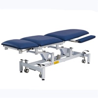 Chaises d'examen de podologie, table de massage électrique, fauteuil de pédicure, civière de physiothérapie Camilla, lit de thérapeute, banc, canapé d'examen médical