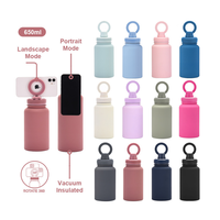 Bouteilles à vide à double paroi de 1L 32oz personnalisées bouteille d'eau isolée en acier inoxydable bouteille d'eau MagSafe magnétique avec support pour téléphone