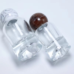 ขวดน้ำหอมแก้วทรงกลมหรูหราขนาด 50 มล. ฝาปิดลายหินอ่อน ฐานขวดรูปภูเขา ดีไซน์โดดเด่น - Product Image 6