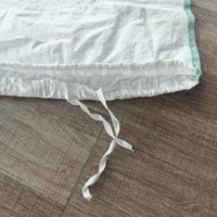 Sac en polypropylène tissé PP blanc à cordon avec ligne de marque verte Capacité de 50kg pour l'emballage de maïs, de maïs et de riz