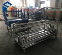 Machine à plier et à coudre automatique