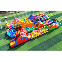 Structure gonflable commerciale combinée colorée avec toboggan et parcours d'obstacles pour enfants et adultes