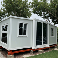 Maison conteneur modulaire en acier évolutive, conception à porte coulissante, bonne respirabilité, installation rapide pour bâtiments de bureaux