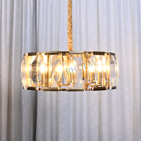Lustre rond en cristal de luxe à intensité variable pour salle à manger et salon, idéal pour projets hôteliers et villas - Fournisseur d'éclairage OEM personnalisé