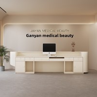 Bureau de réception laqué moderne haut de gamme personnalisé pour les cours de formation en studio de yoga de bureau d'esthétique médicale-pour caissier de réception