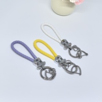 Porte-clés mignon en forme de tête d'ours tressé en cuir avec mousqueton, corde en PU colorée, anneau en alliage de zinc, pour femmes et couples, tendance et écologique