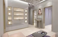 Vitrine de présentation de bijoux en or, design moderne et luxueux, éclairée par LED, écologique, pour magasin de bijoux, OEM