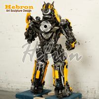 Özel Boyut Büyük Dış Mekan Metal Dev Robot Heykeli LED Işıklı Paslanmaz Çelik Megatron Heykeli