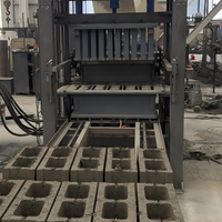 Petite machine automatique de fabrication de pavés autobloquants avec moule PLC, dotée d'un moteur, d'un roulement, d'une engrenage et d'une ligne de production de briques de sable