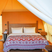 Tente de safari de luxe pour 2 à 4 personnes avec plateforme et salle de bain