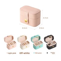 Boîte à bagues mini portable de style européen et américain MC, organiseur de boucles d'oreilles, étui de rangement en cuir avec fermeture à bouton pour bijoux