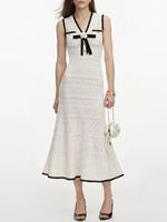 Robe midi élégante en maille blanche sans manches à col en V et nœud ajouré, style français, pour femme, collection été 2026