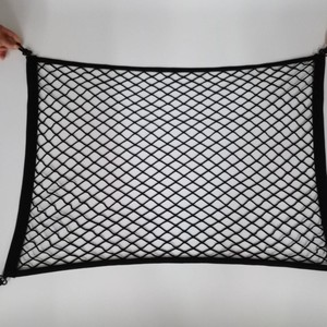 Filet de rangement double couche en polyester pour coffre de voiture, idéal pour l'organisation automobile et la maison - Product Image 1