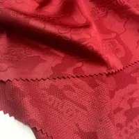 Shaoxing Textilien Vogel auge 100% Polyester Stricken geprägte rote Mesh Öse Sport bekleidung Stoff für Kleidung
