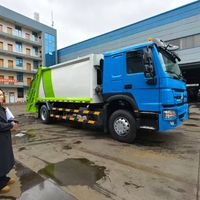 Camion Compacteur de Déchets Diesel Euro 3 Manuel 4x2 Howo 15m³ de Haute Qualité à Chargement Arrière pour le Transport et la Compression des Déchets