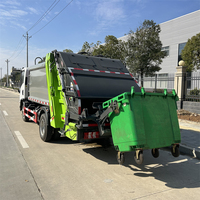 Camion à ordures à compression Shacman de 6 mètres cubes, camion à ordures compacteur de 6000 L pour la collecte et le transport des déchets