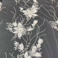 Tissu en dentelle suisse brodé de fleurs 3D en sequins perlés de haute qualité personnalisé pour robe