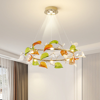 Lustre suspendu LED de luxe haut de gamme en fer forgé pour bureau à domicile, avec fleurs en cristal K9 colorées et cadre doré
