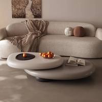 Hochwertiger Moderner Kleiner Wohnungs-Couchtisch aus Holz Drehbar Oval Kieselstein-Design Leichter Luxus Einfach Kreativ Spezialform